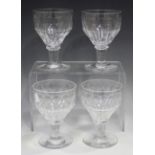 A set of four glass rummers, late 19th/20th century, each ogee bowl with panel cut decoration,