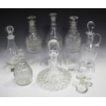 A group of 19th century and later glass decanters and stoppers, including a ship's decanter and four
