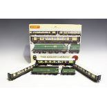 A Hornby gauge OO R.2369 The Golden Arrow train pack and R.4196 The Golden Arrow coach pack, both