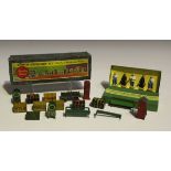 A Dinky Toys No. 5 train and hotel staff set and a Hornby Series No. 3 platform machines and seats