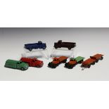 A collection of Dinky Toys commercial and public transport vehicles, including two No. 25T flat