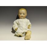 An Armand Marseille bisque head baby doll, impressed '518/3½K', with painted moulded hair,