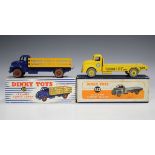 A Dinky Toys No. 931 Leyland Comet lorry, within a blue and white striped box, together with a No.