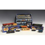 A collection of Hornby Dublo three-rail items, including a tank goods set, comprising 0-6-2