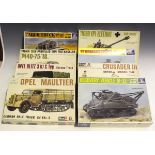 A collection of plastic model kits by Airfix, Revell and Italaerei, including military vehicles,