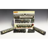 A Hornby gauge OO R.2300 Bournemouth Belle train pack and two R.4169 Bournemouth Belle Pullman coach