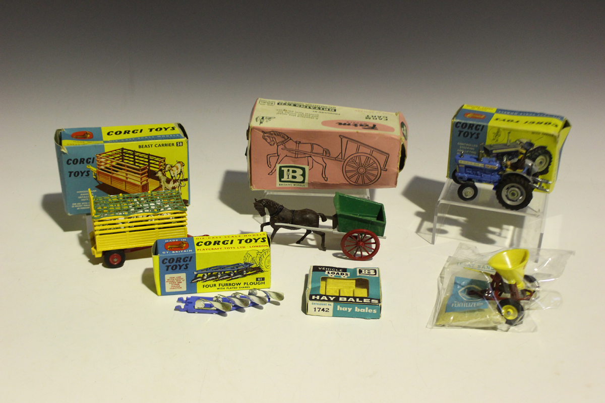 A collection of various Britains plastic figures and accessories, including farm, garden,