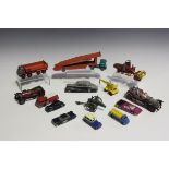 A collection of playworn diecast vehicles, including a Dinky Toys No. 182 Porsche 356A, a No. 107