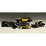 Four plastic kit-built model cars, comprising an Airfix Connoisseurs Series 1/12th scale 1930