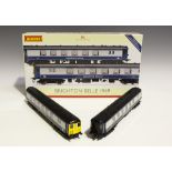 A Hornby gauge OO R.2988X Brighton Belle 1969 train pack, boxed, and three Brighton Belle cars,