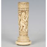 An 18th century bone and ivory mounted walking cane handle, the shaft carved with a continuous scene