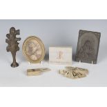 A small group of collectors' items, including a cast bronze abstract figure, detailed 'Vitali A15