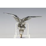 A 20th century chromium plated cast metal car mascot in the form of an eagle, possibly from an