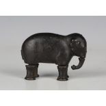 A cast iron novelty walking elephant toy, impressed 'Patent 1873', length 8.5cm.Buyer’s Premium 29.