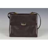 An Asprey of London brown leather handbag, width 26cm, with shoulder strap and cloth bag.Buyer’s