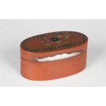 A George III red papier-mâché oval snuff box, the lid inlaid in various metals with flowers and