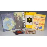 A small collection of material relating to the progressive rock band Yes, including two seven inch