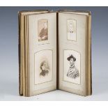 A Victorian leather album containing various carte-de-visite photographs of mainly family