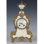 A late 19th century French ormolu mounted white marble mantel clock, the eight day movement with