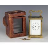 An early 20th century French brass cased carriage clock with eight day movement striking hours and