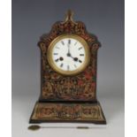 A mid to late 19th century French ebonized and red tortoiseshell boulle cased mantel clock, the