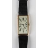 A J.W. Benson 9ct gold curved rectangular cased gentleman's wristwatch with signed jewelled
