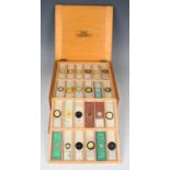 A collection of one hundred and forty-four microscope specimen slides, late Victorian and mostly
