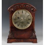 A Victorian figured mahogany bracket clock with eight day twin fusee movement striking on a gong,