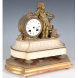 A late 19th century French gilt spelter and alabaster mantel clock with eight day movement