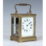 A 19th century/early 20th century French brass cased carriage clock with eight day movement striking