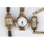 A 14ct gold square cased lady's wristwatch, circa 1950, the silvered dial with gilt Arabic numerals,