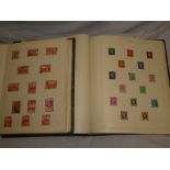 Two folder albums containing a selection of GB and British Commonwealth stamps,