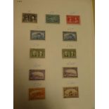 A folder album containing a collection of Canada stamps,