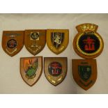 A Naval wall plaque "3 Troop RA" and six various Military plaques including Command Light Battery