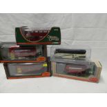 Five mint and boxed diecast buses including London Transport single and double deckers