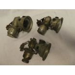 Three various old carbide motorcycle lamps including Lucas Calcia Major etc (af)
