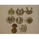 Eight original Highland cap badges including Tyneside Scottish, Royal Scots Fusiliers, KOSB,