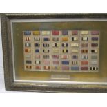 A display of old medal ribbons "Ribbons of War medals worn by British soldiers" in glazed display