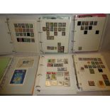 A large collection of German stamps contained in ten folder albums including German States,