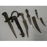 Four various daggers including Eastern dagger with 5 1/2" blade,