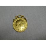 An Edward V11 1902 gold £2 piece with attached scroll pendant mount