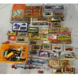 A large selection of various boxed and unboxed diecast vehicles including Corgi, Lledo,