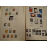 Two folder albums containing a collection of Holland stamps 1852 onwards, mint stamps, blocks,