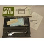 A planimeter set with optical tracer and instuctions,
