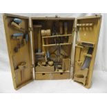 A childs toy carpentry set in fitted wooden case