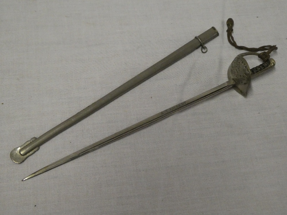 A miniature George V Infantry Officers sword and scabbard 9 1/2" long overall
