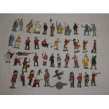A selection of various vintage metal soldiers,