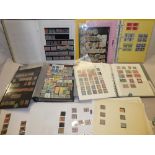 Four albums and a selection of album sheets containing a collection of German stamps including