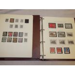 Two folder albums containing a collection of New Zealand stamps