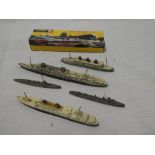 Five early metal waterline ships (af) and a Japanese boxed submarine kit